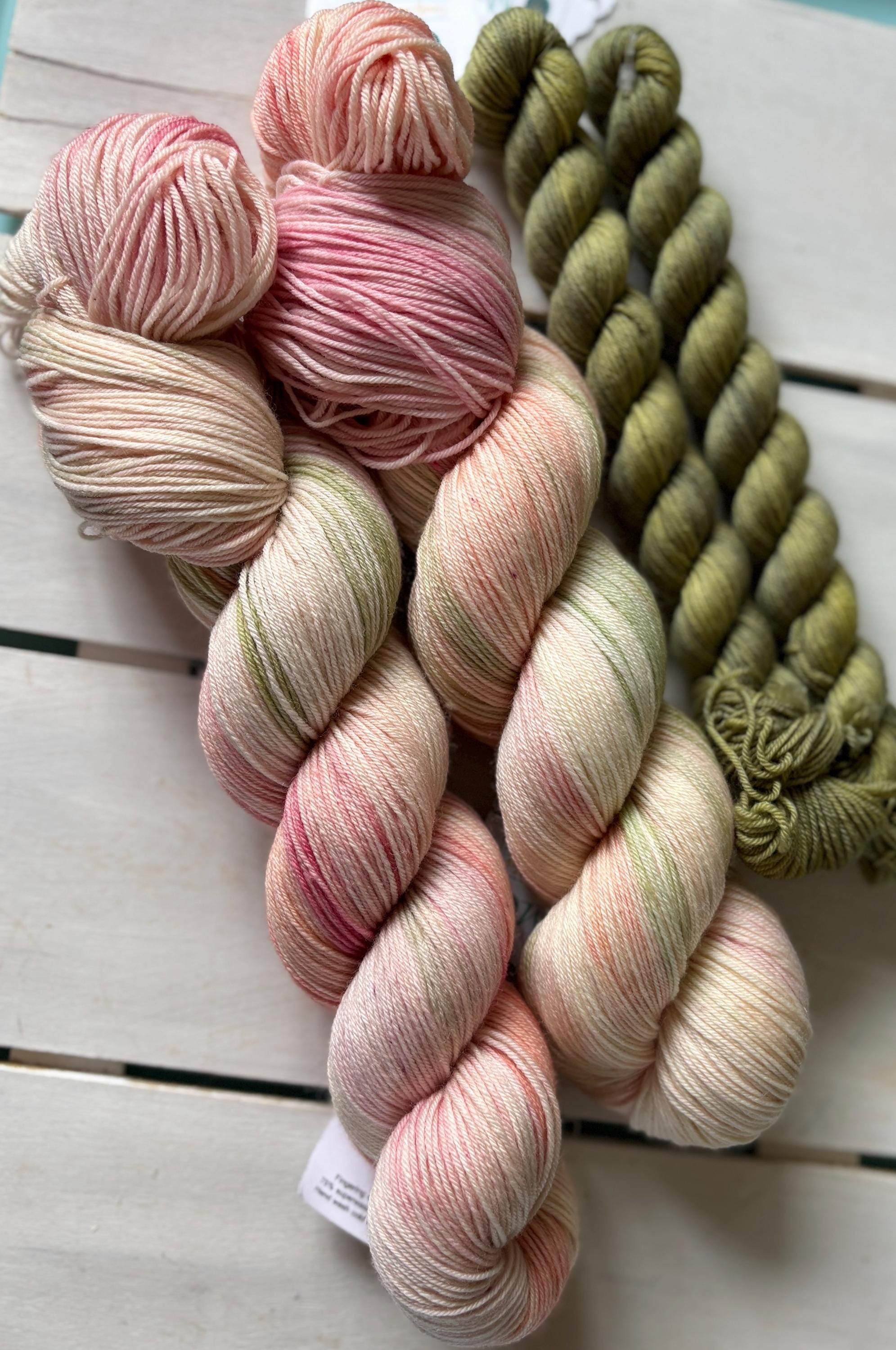 Pretty Petals, peach pink with a soft sage green,DK and fingering
