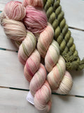 Pretty Petals, peach pink with a soft sage green,DK and fingering