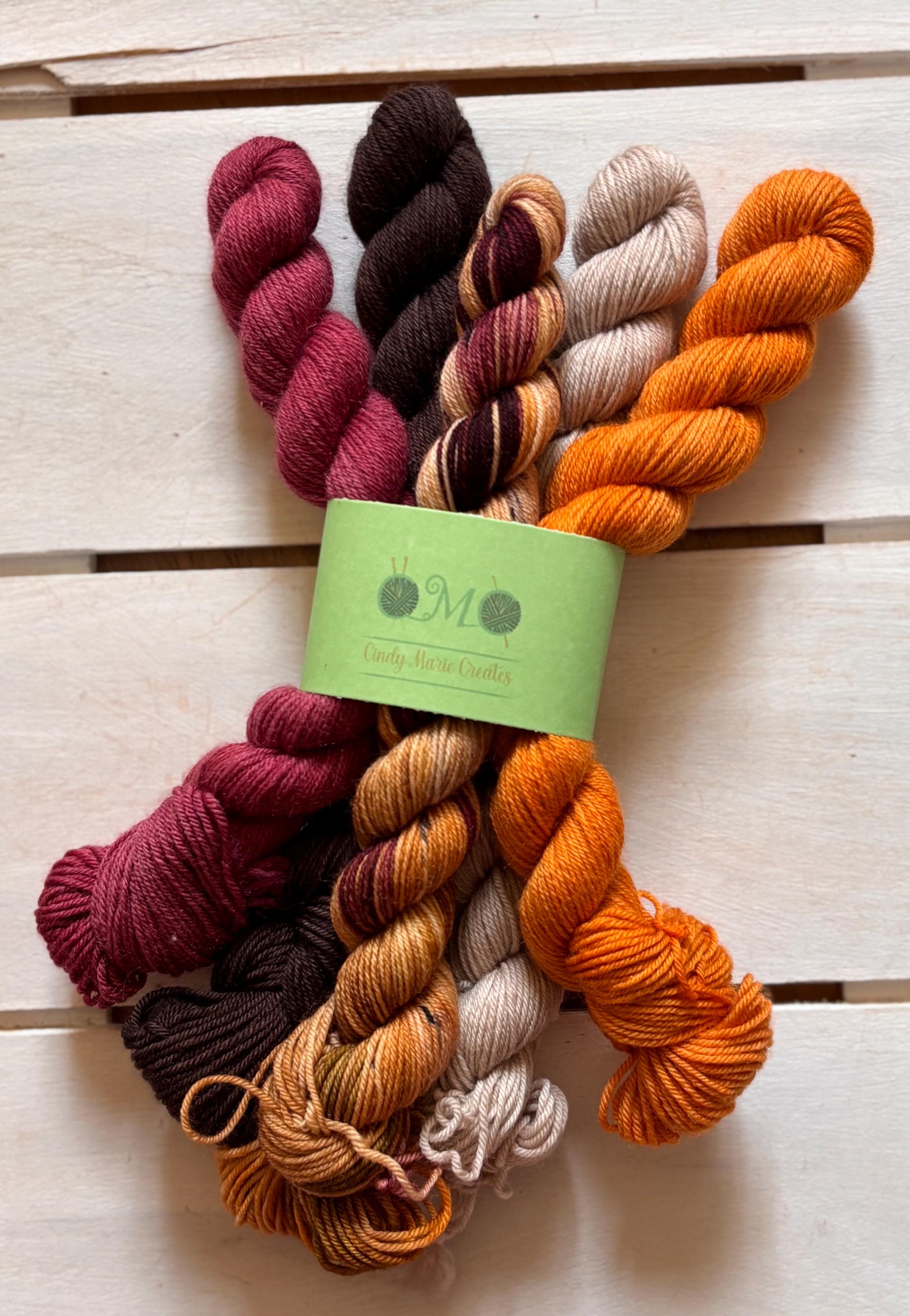 Fern Gully brown, beige, green, maroon, 75/25 merino superwash wool