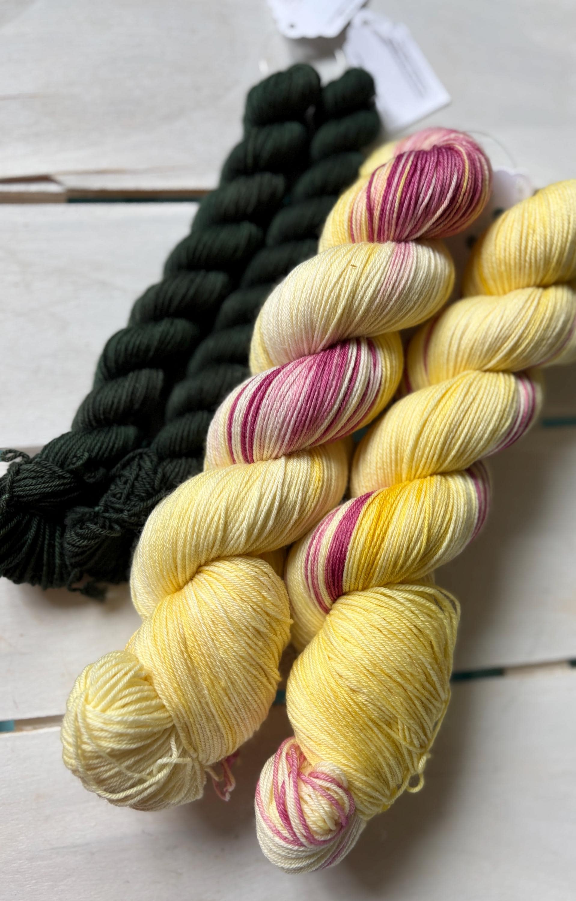 Sunshine Meadow, soft yellow with warm deep pink DK and fingering