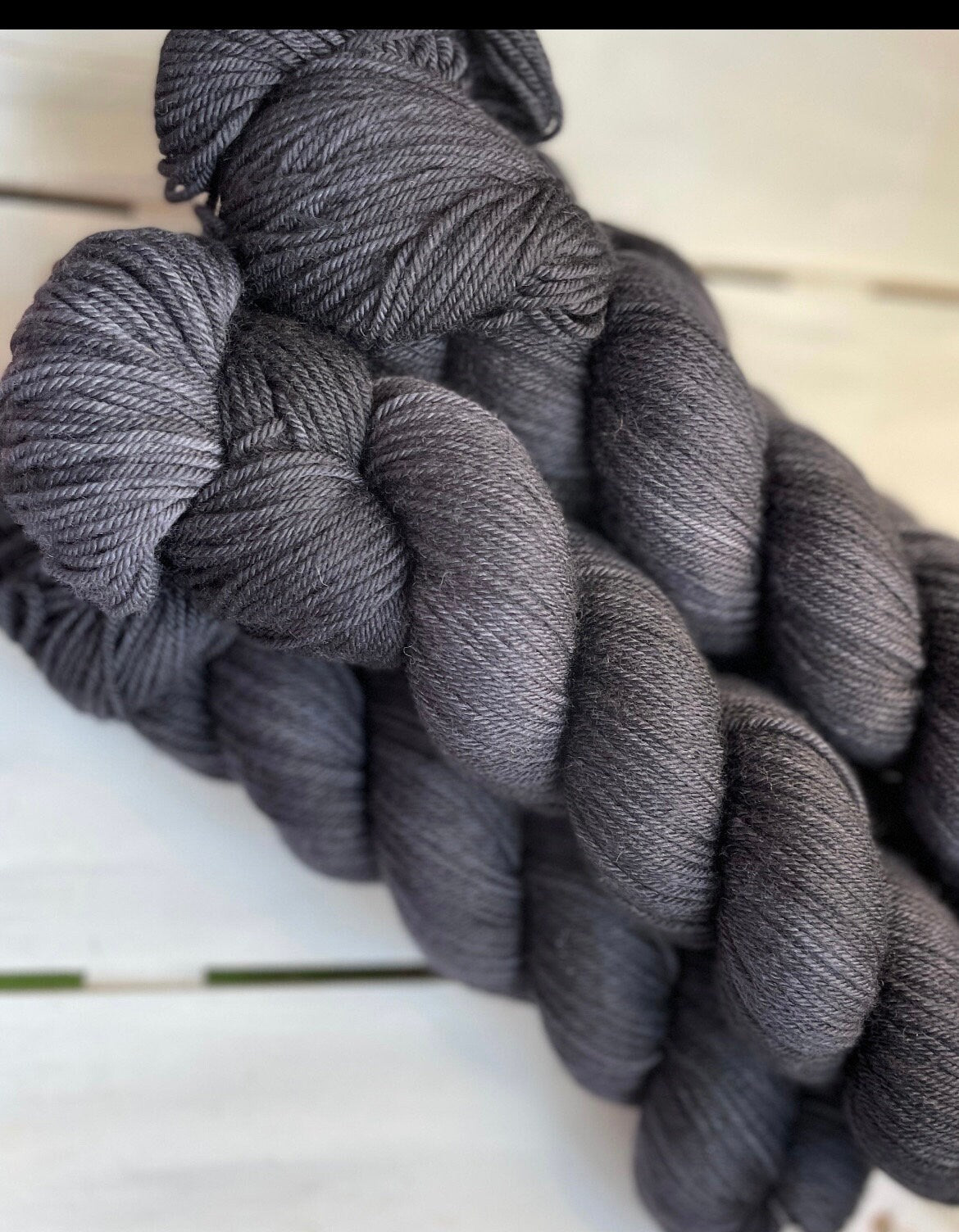 Jet Black, full skein in DK and fingering