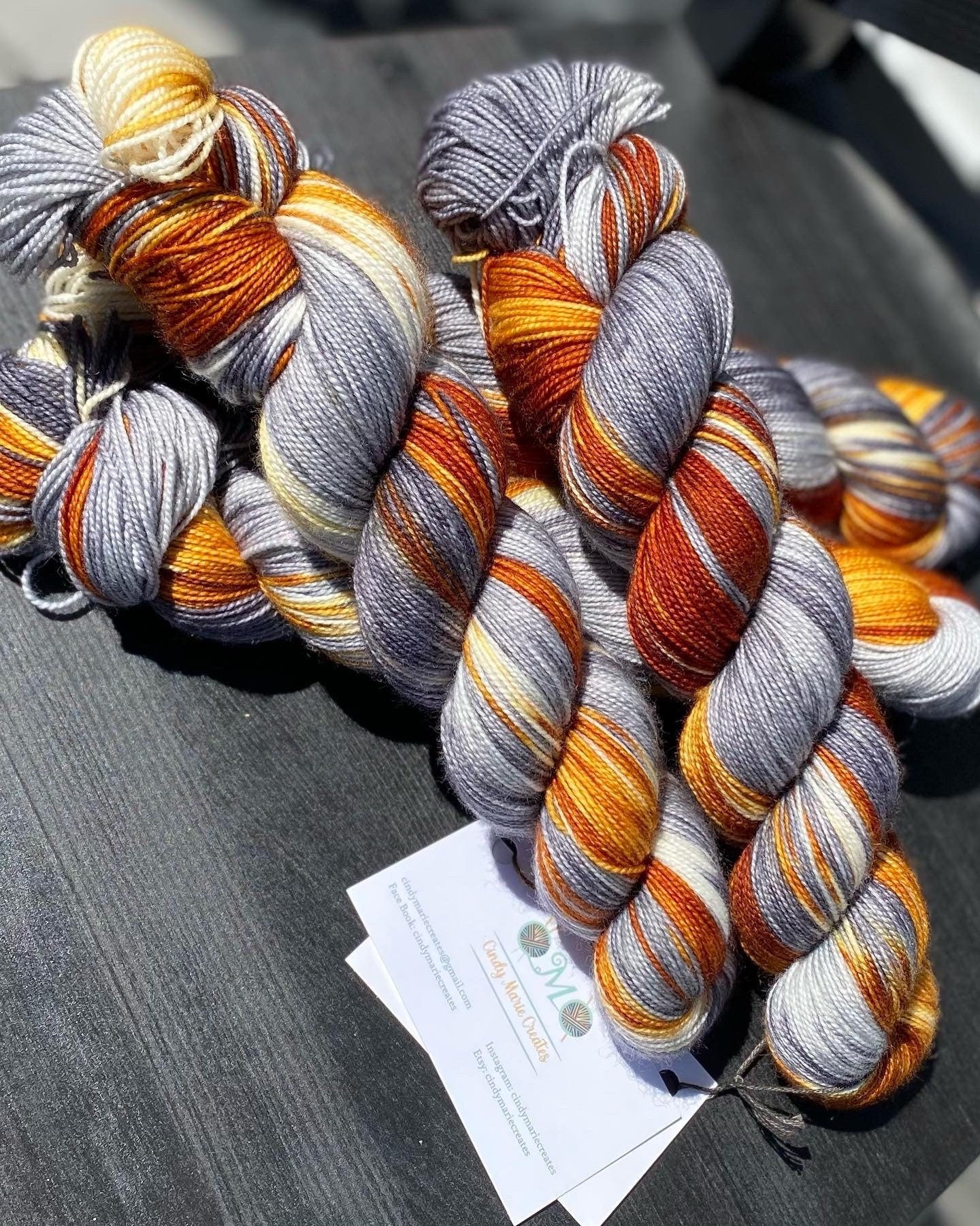 Foxy Lady, brown, golden honey, silver, grey, dark grey, Fingering,  463 yrds/100 grams. Yarn