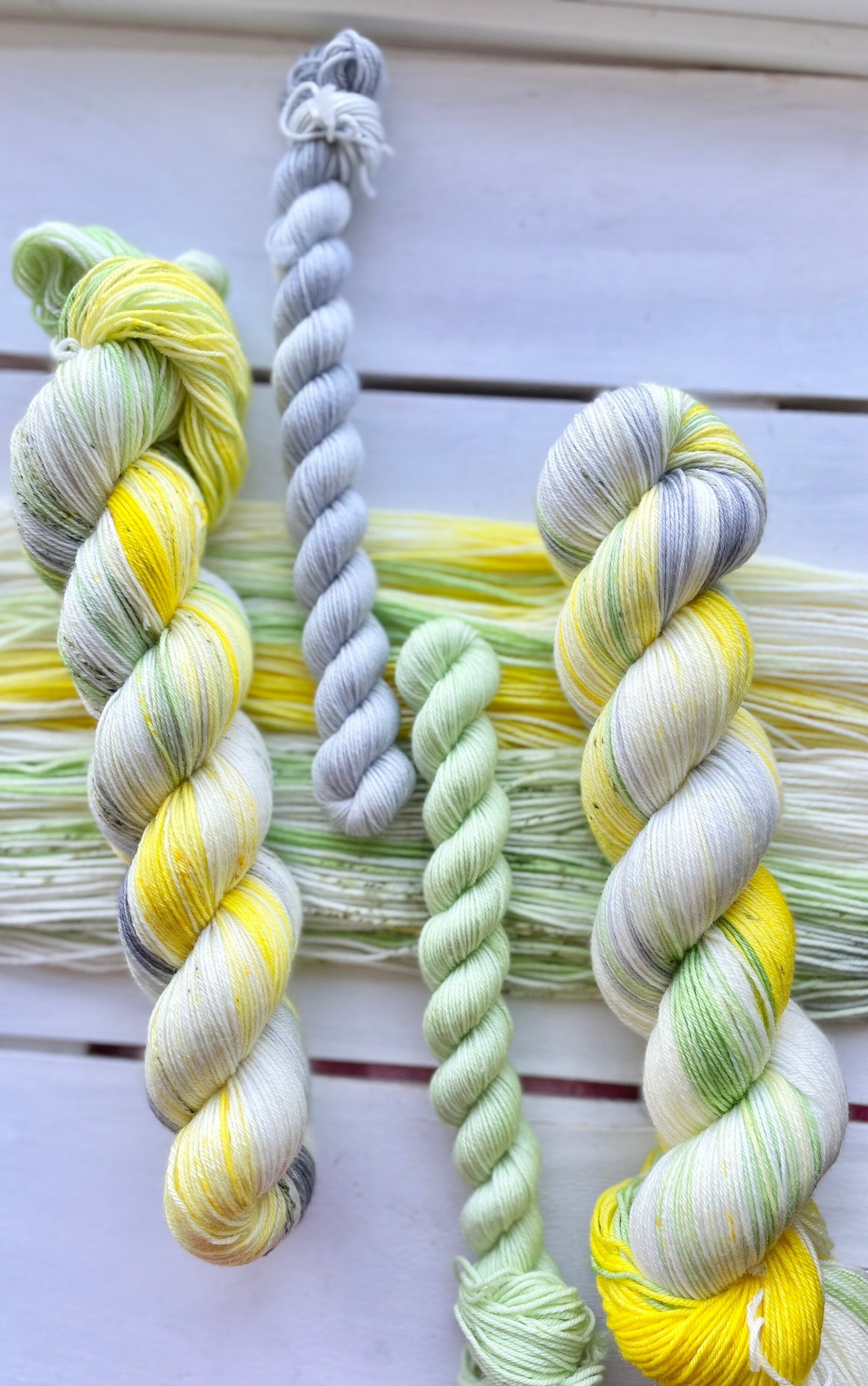 Daisy’s in Waiting, yellow, grey, green superwash merino wool