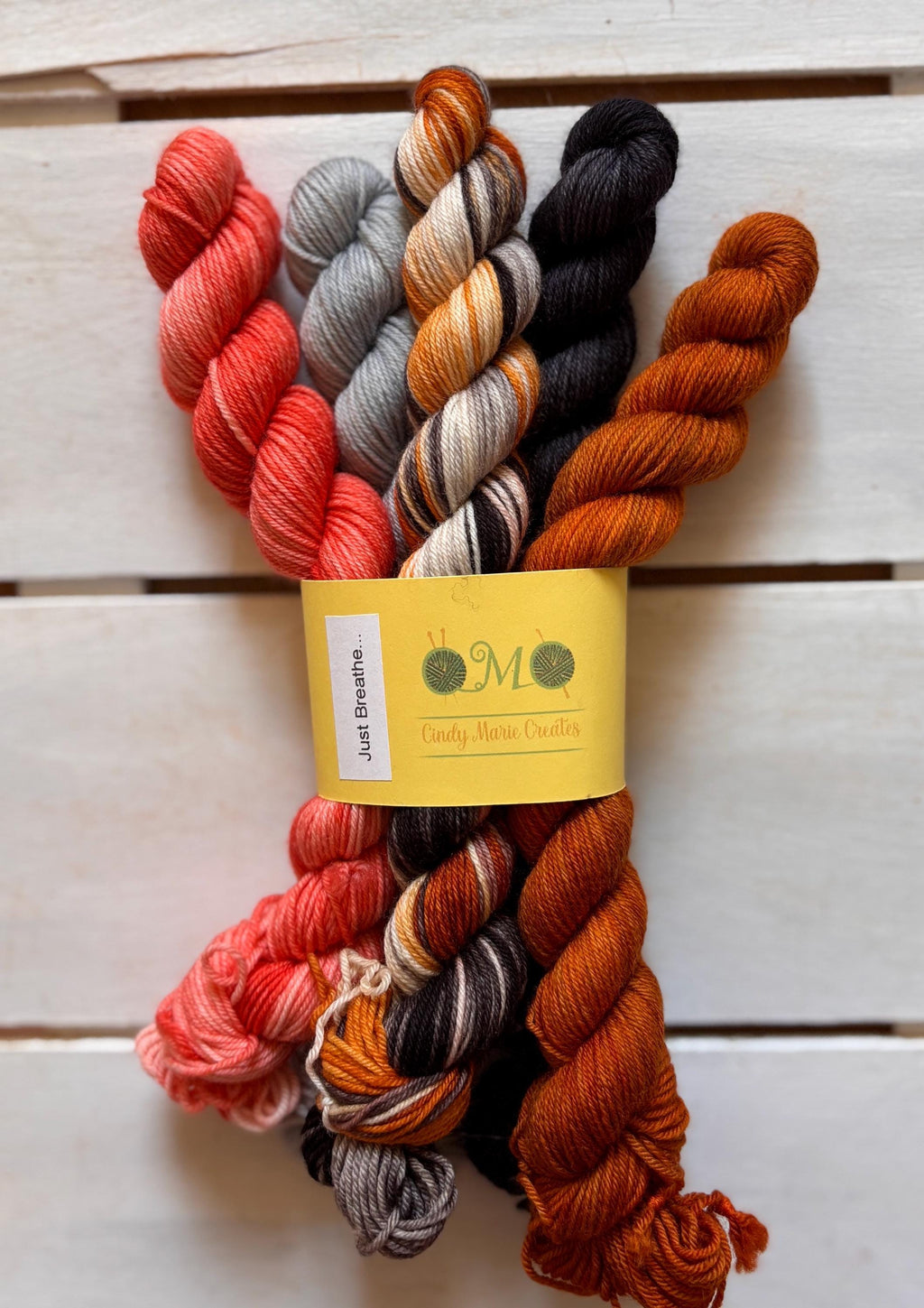 Just Breathe, dark brown, black, peach, 75/25 merino superwash wool