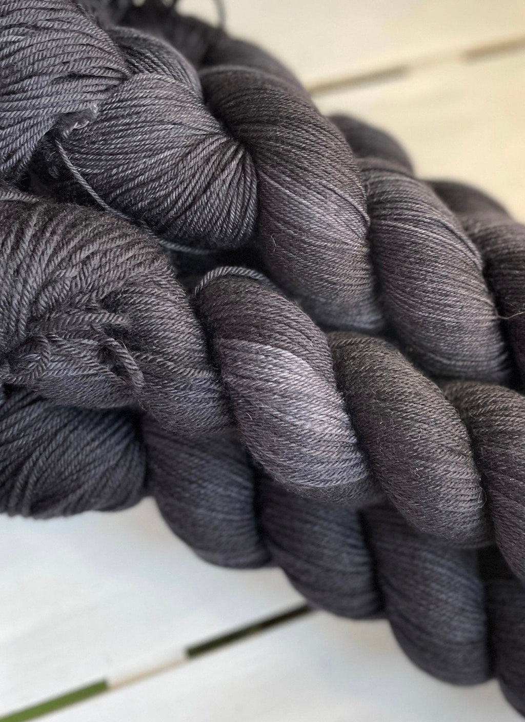 Jet Black, full skein in DK and fingering