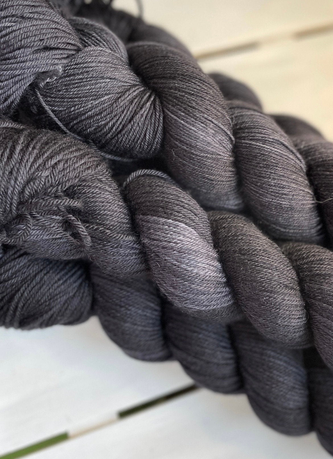 Jet Black, full skein in DK and fingering