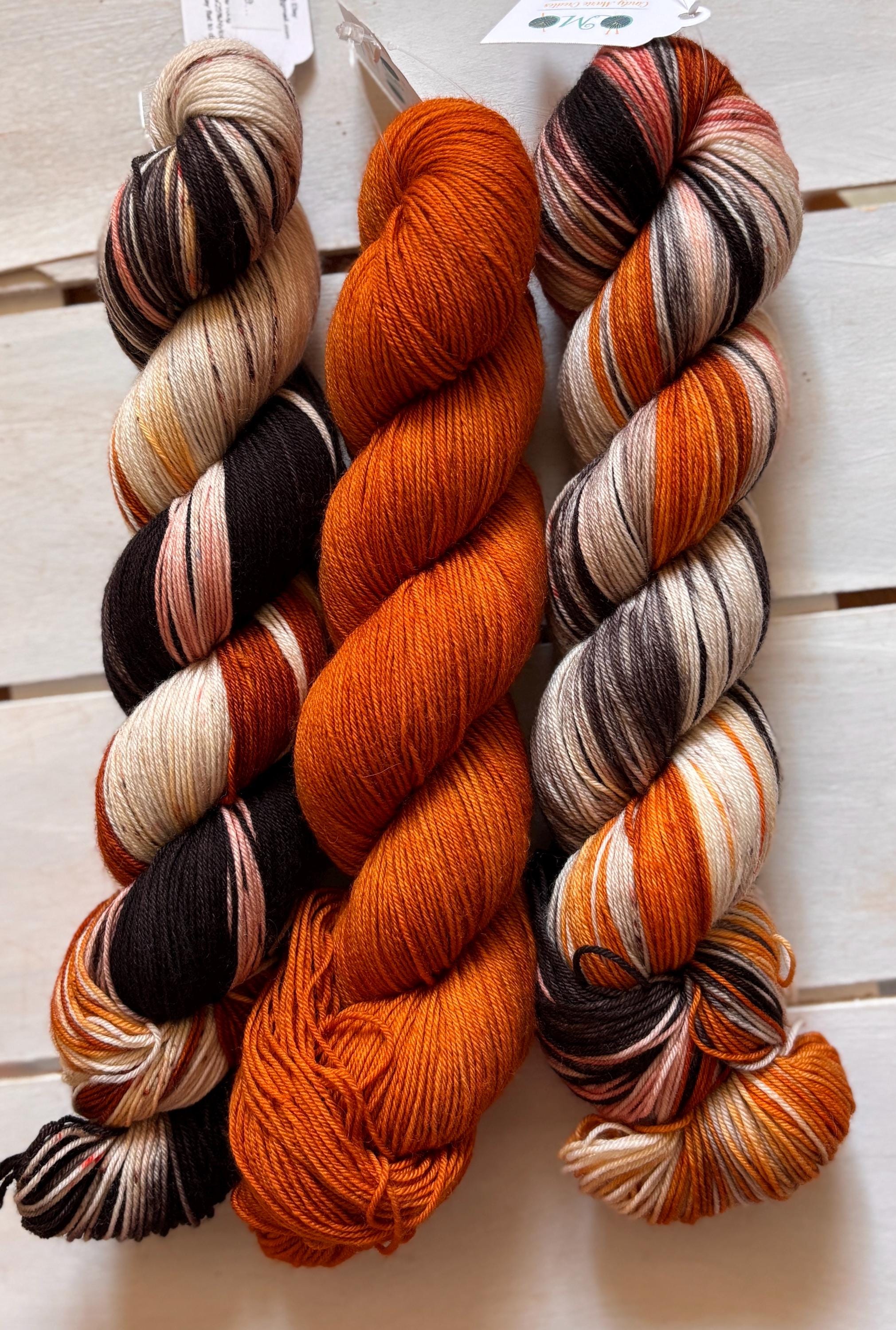Just Breathe, dark brown, black, peach, 75/25 merino superwash wool
