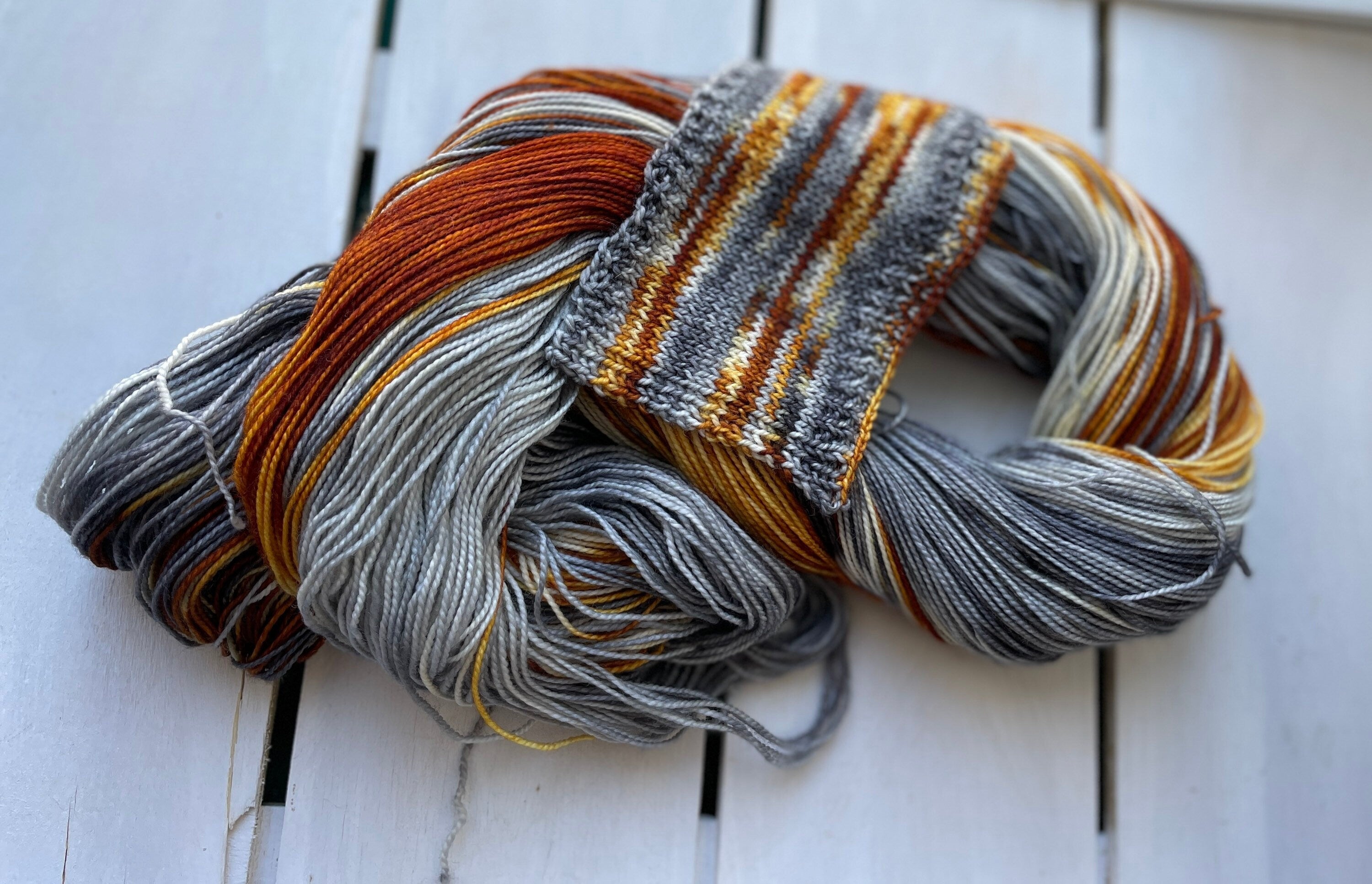 Foxy Lady, brown, golden honey, silver, grey, dark grey, Fingering,  463 yrds/100 grams. Yarn