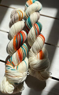 Feathers & Flowers, a merino, hand dyed yarn soft natural beige, saffron orange, teal green