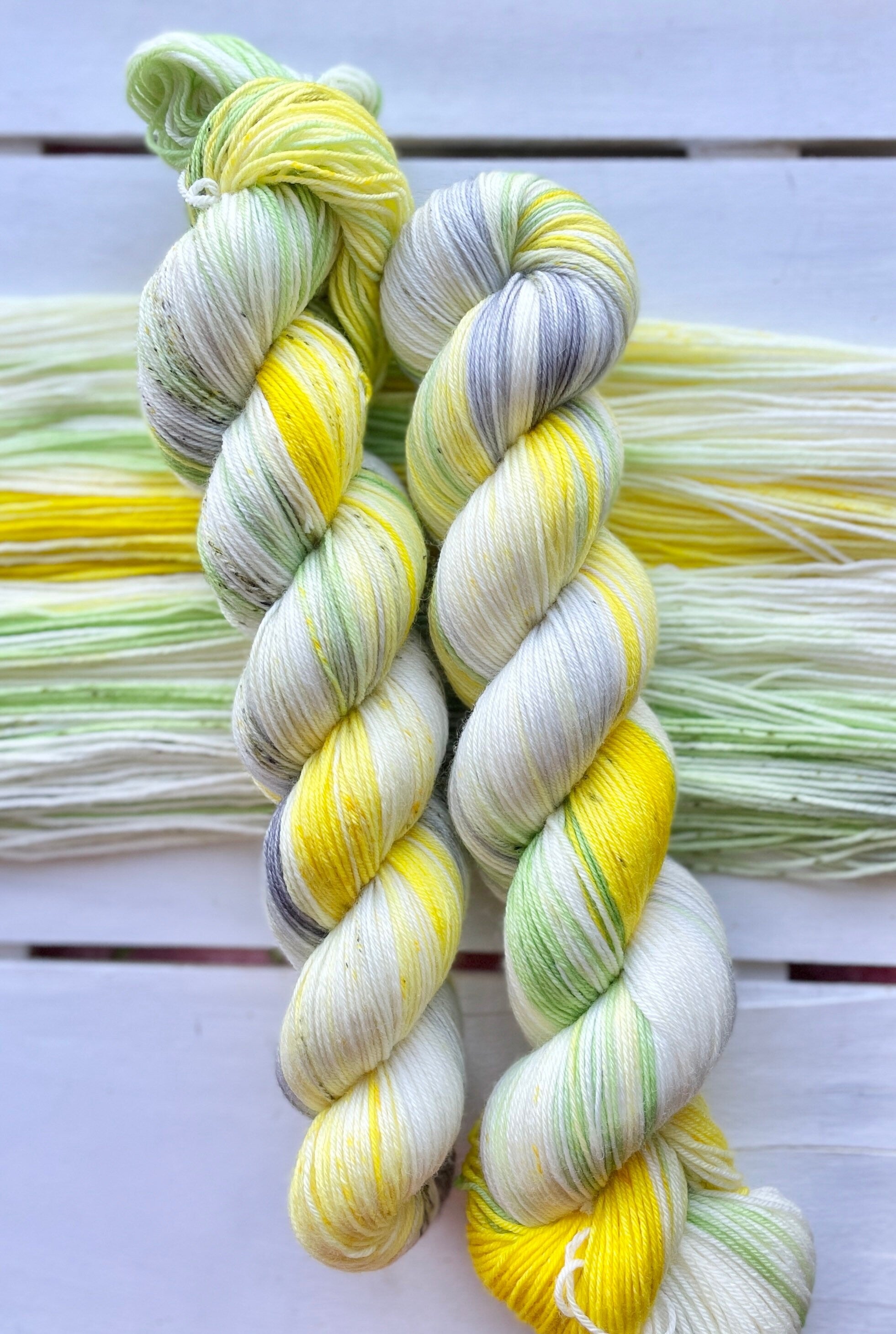 Daisy’s in Waiting, yellow, grey, green superwash merino wool