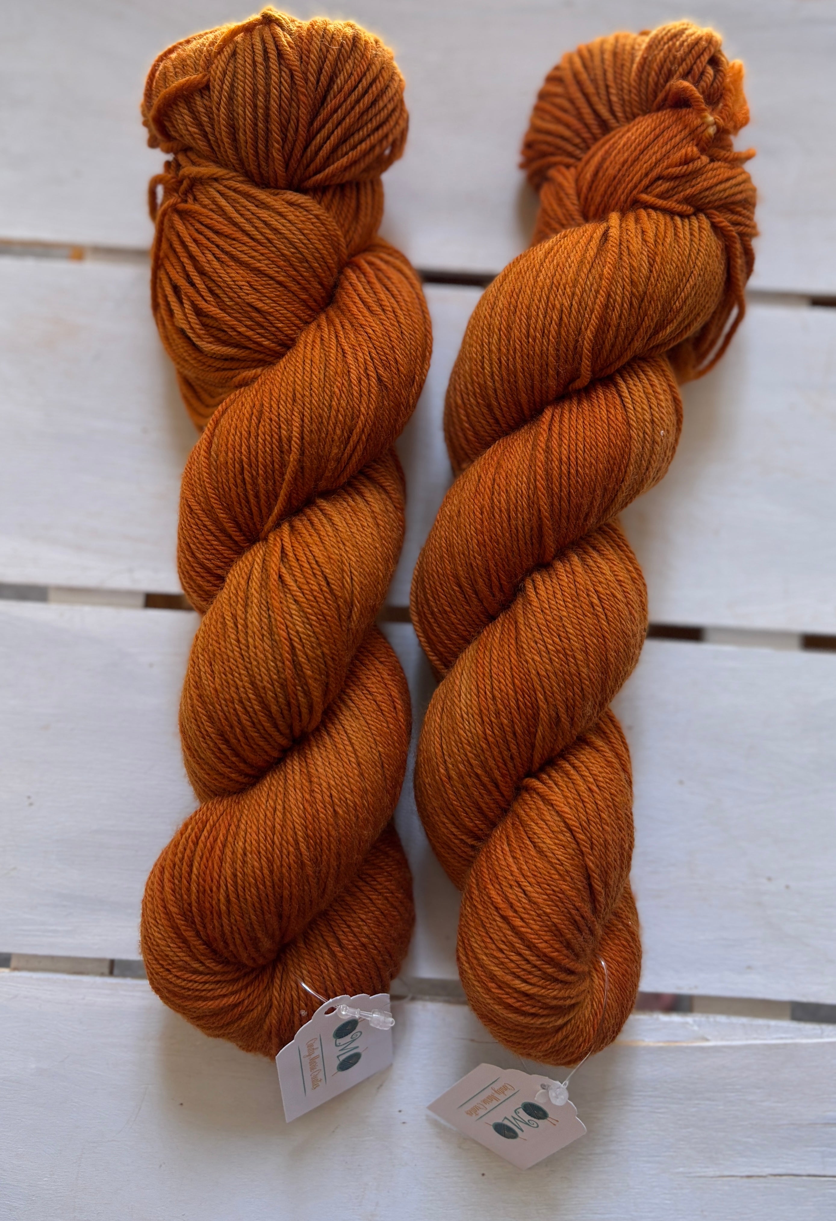 Rust a deep dark burnt orange, merino nylon wool, DK and fingering