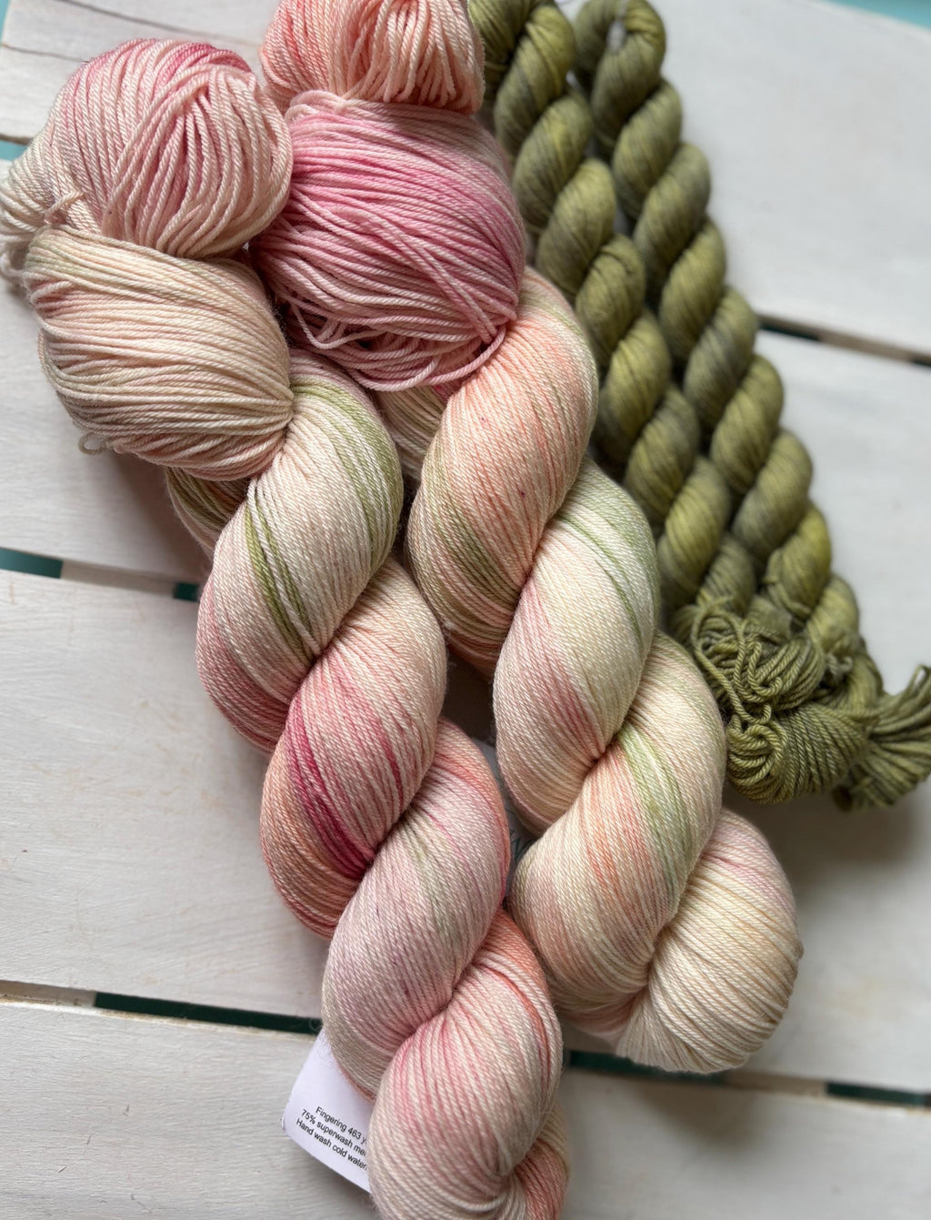 Pretty Petals, peach pink with a soft sage green,DK and fingering