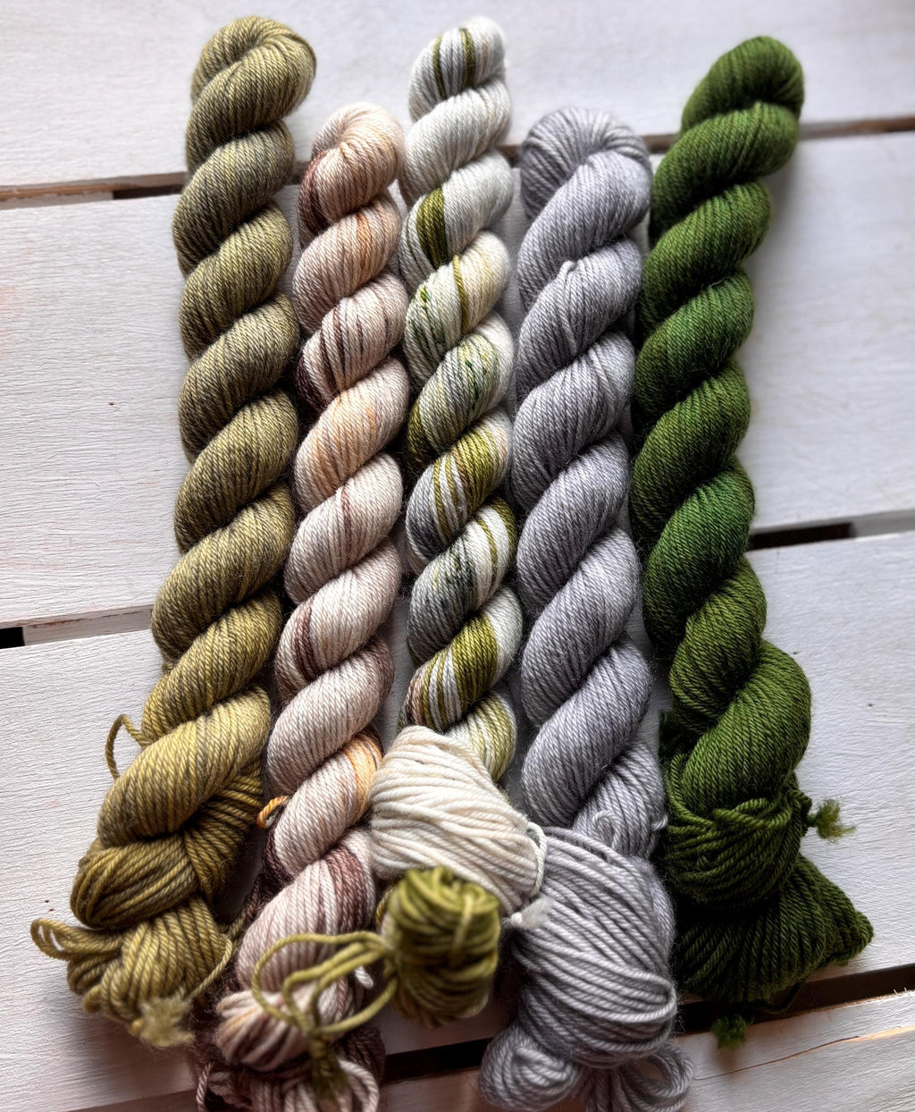Mossy Stone, green, beige, brown, gray 75/25 merino superwash wool