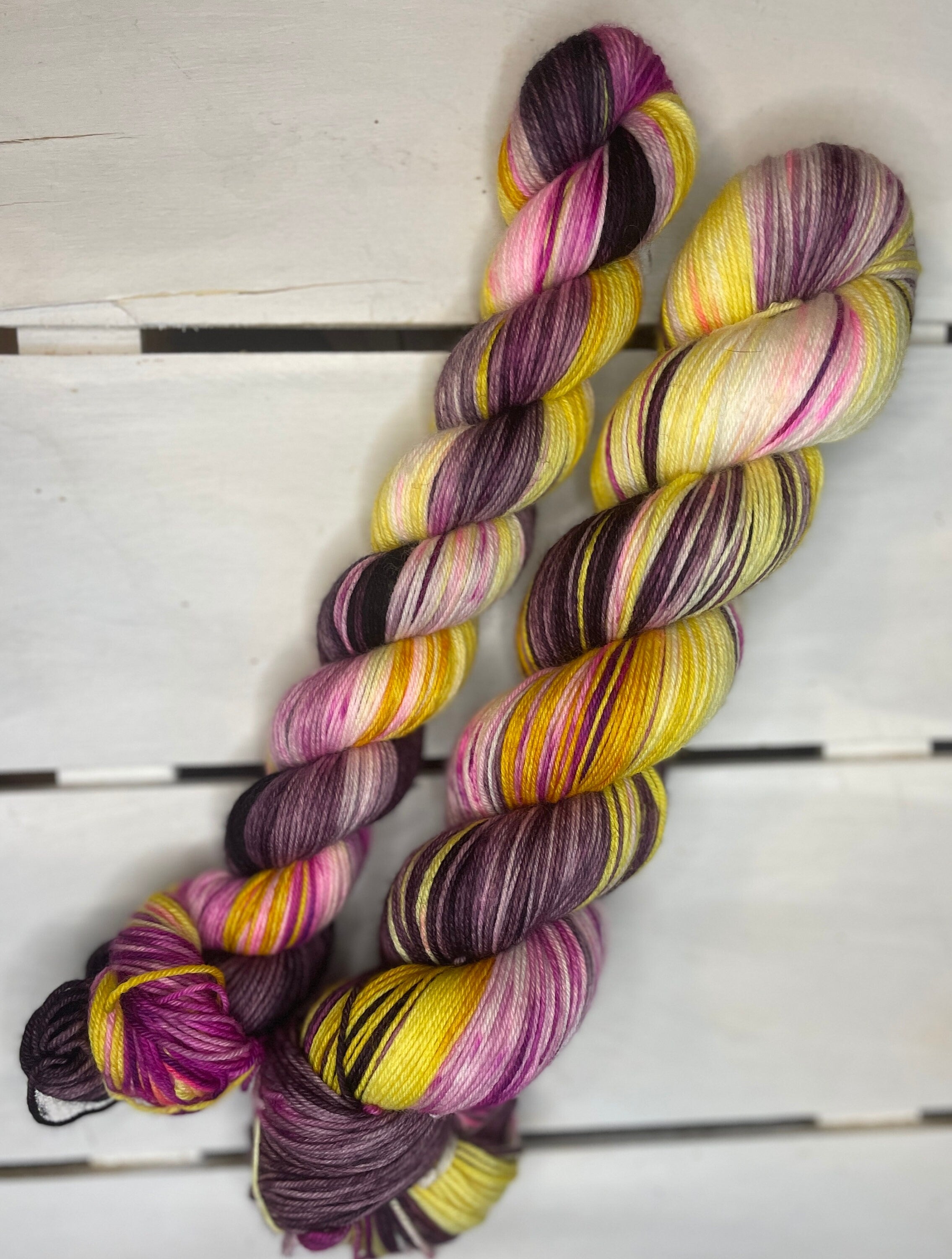 Purple Sun Daisy, DK, purple, yellow, pink superwash merino wool